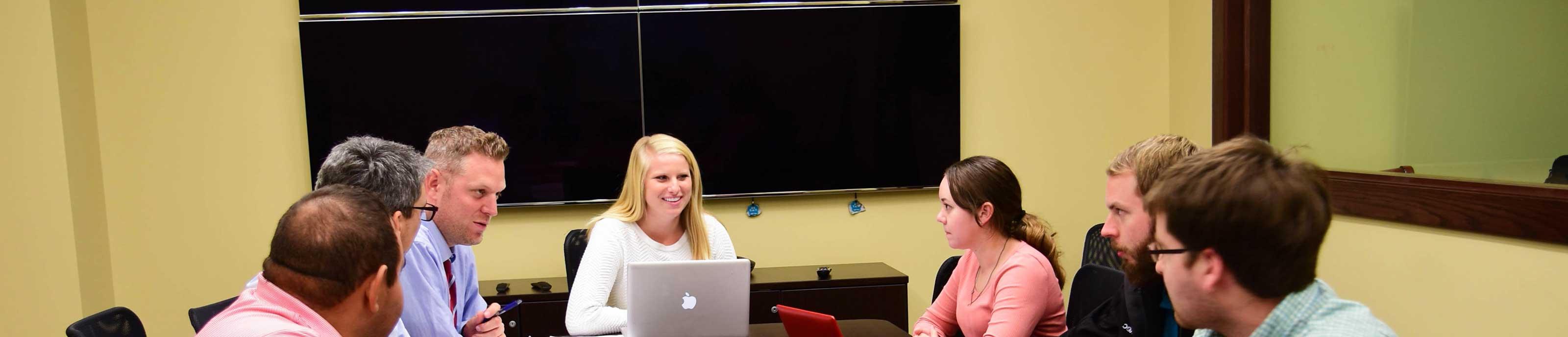 MBA students in class in the Thompson Trading Room